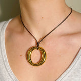 Dome centerpiece cord necklace