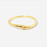 spiral gold ring clear stone accent